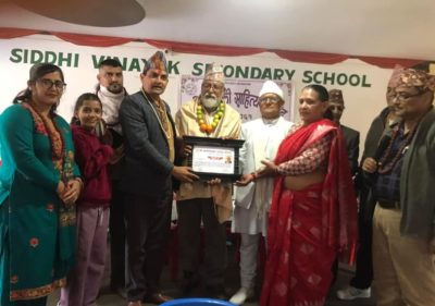 हास्यव्यङ्ग्यकार लुइँटेल कालीगण्डकी साहित्य परिषदद्वारा सम्मानित